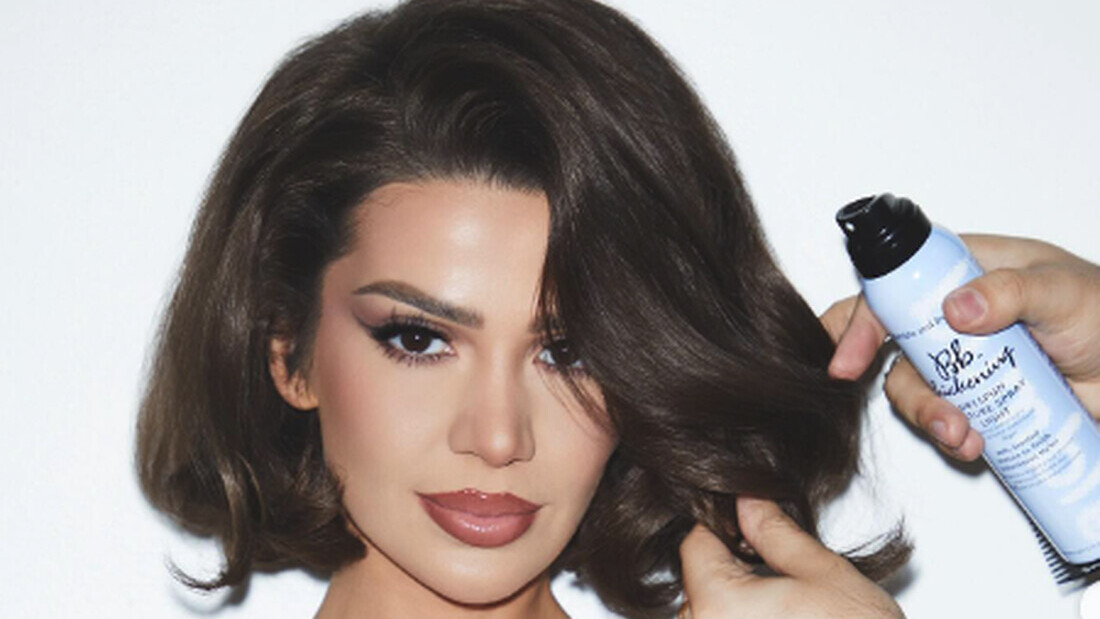 Foinika Kay with full Big Hair Energy volume, Bb Thickening Dryspun Texture Spray applied on set